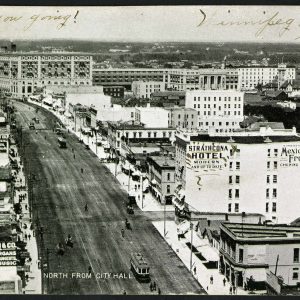 Main street showing Strathcona Hotel on right. COWA Martin Berman Postcard Collection.